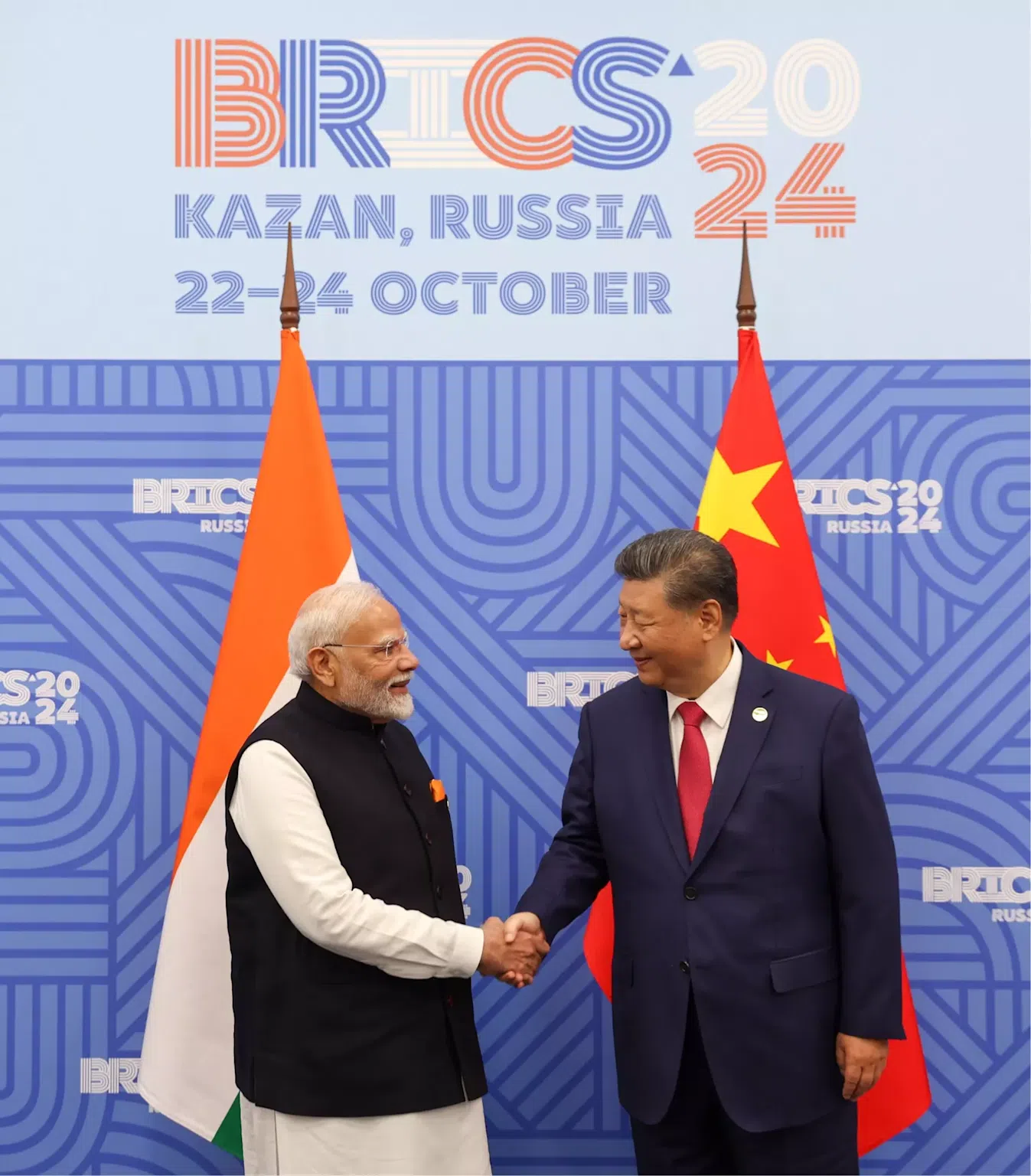 Prime Minister Narendra Modi shakes hands with Chinese President Xi Jinping during the BRICS 2024 summit in Kazan, Russia, symbolizing diplomatic engagement