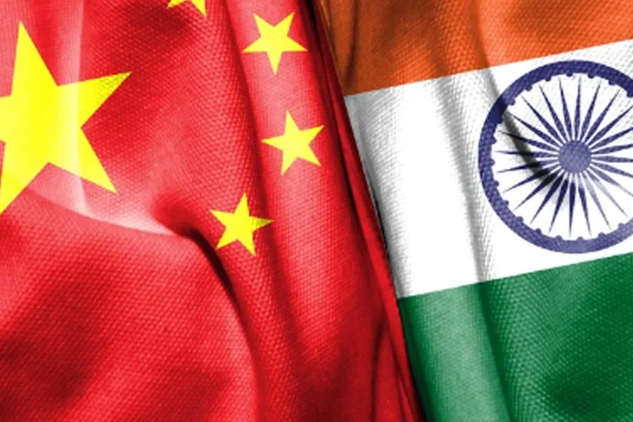 Flags of China and India side by side representing diplomatic relations between the two countries